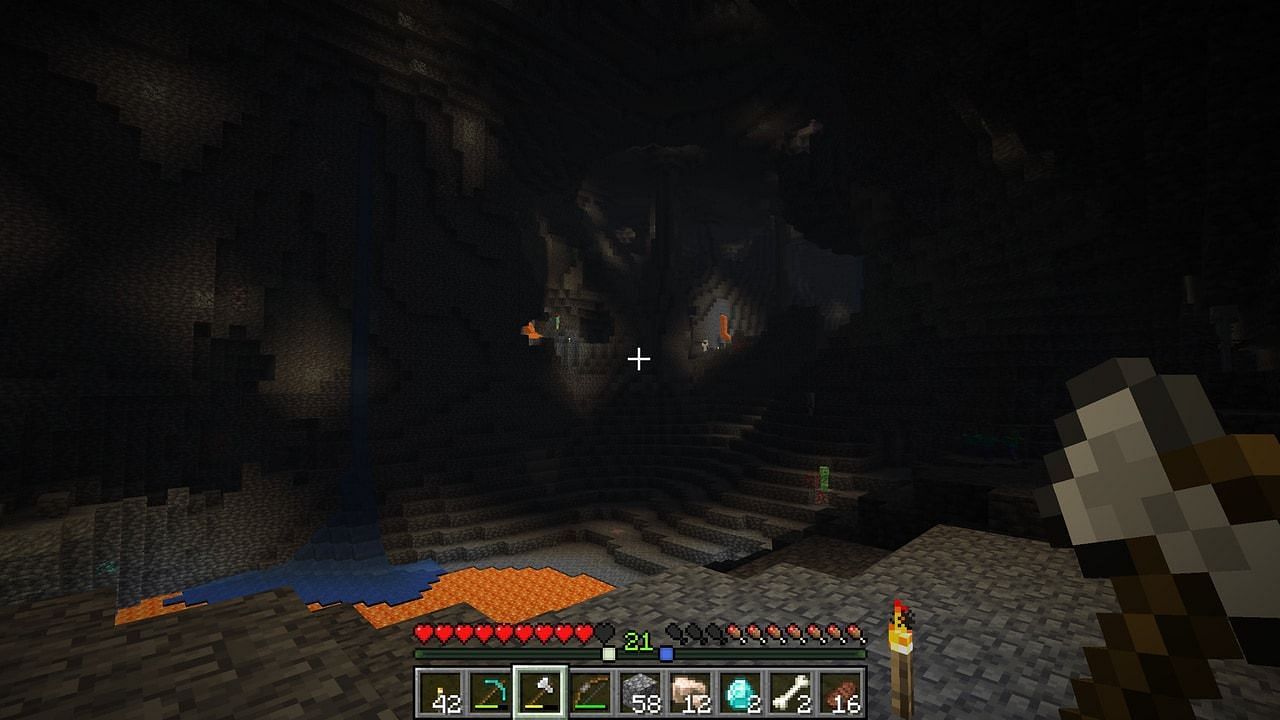 A player using the locator bar to find their friends in a large cave with skeletons onlooking. (Image via Mojang)